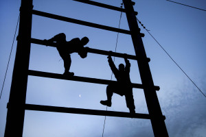 120316-A-XN107-604 Soldiers climb an obstacle during a noncommissioned officer professional development event at Fort Bragg, N.C., on March 16, 2012. The soldiers, assigned to the U.S. Army Reserve Command headquarters, negotiated the obstacles and provided teamwork when necessary to complete each station. DoD photo by Timothy L. Hale, U.S. Army. (Released)